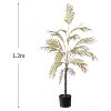 Artificial palm tree with natural trunk and realistic leaves, perfect for decorating living rooms, bedrooms, and office corners. - 2 of 4
