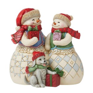 Jim Shore 5.0 Inch Snuggled Up Together Snow Couple With Puppy Snowman Figurines - 1 of 2