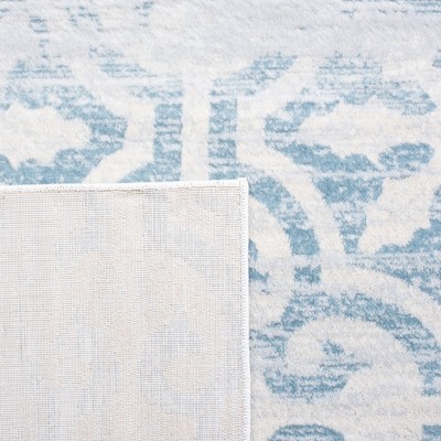Ivory and Turquoise 8' x 10' Hand-Knotted Synthetic Area Rug