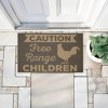 Stupell Industries Free Range Children Caution Printed Outdoor Door Mat, design by Dana Saulnier, 18"x30" - 3 of 4