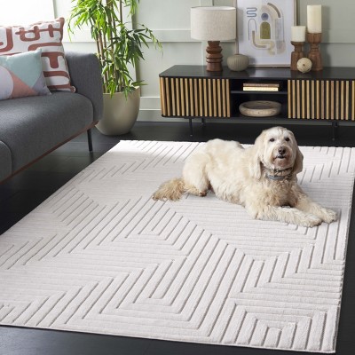 Ivory Geometric Synthetic Rectangular Area Rug 5'3" x 7'6"