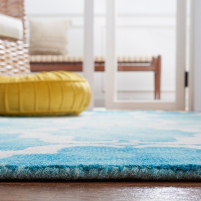 Ivory and Turquoise Hand-Tufted Wool Area Rug 8' x 10'