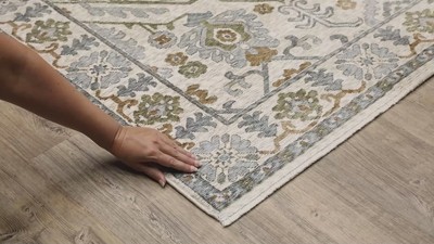 Hastings Ivory and Green Synthetic Rectangular Area Rug 5'3" x 7'6"