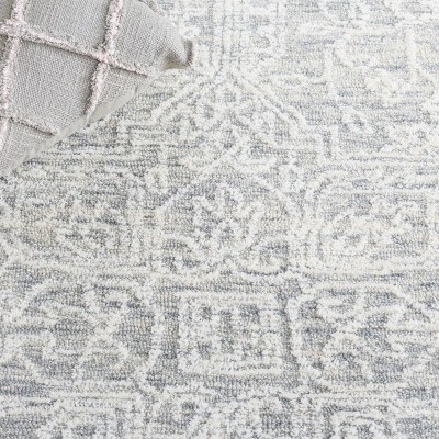 Ivory Rectangular Hand-Tufted Wool Area Rug 60" x 36"