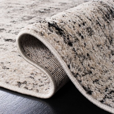 Silver and Black 6' x 9' Synthetic Rectangular Area Rug