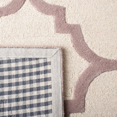 Hand-Tufted Beige/Ivory Wool 6' x 9' Area Rug