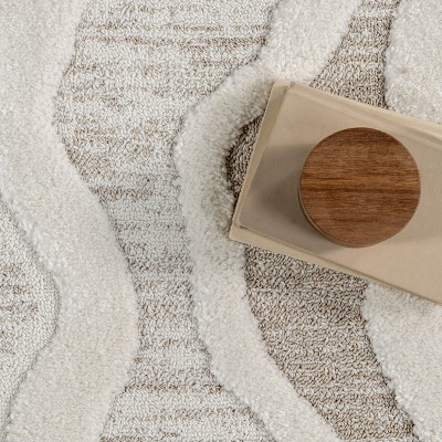 Ivory and Beige Abstract High-Low Tasseled 6'7" x 9' Area Rug