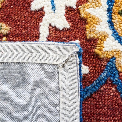 Handmade Floral Elegance Blue Wool Rug - 4' x 6' Tufted Design