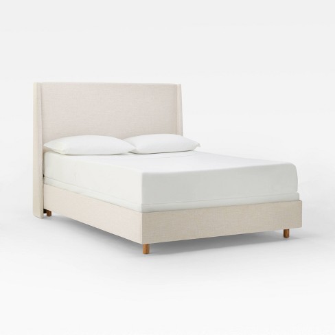 Upholstered bed deals cream