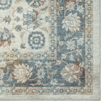 Ivory and Blue Floral Synthetic 5' x 7' Area Rug