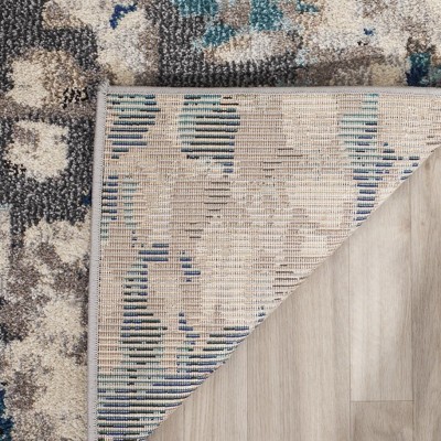 Boho-Chic Gray Geometric Synthetic 10' x 14' Area Rug