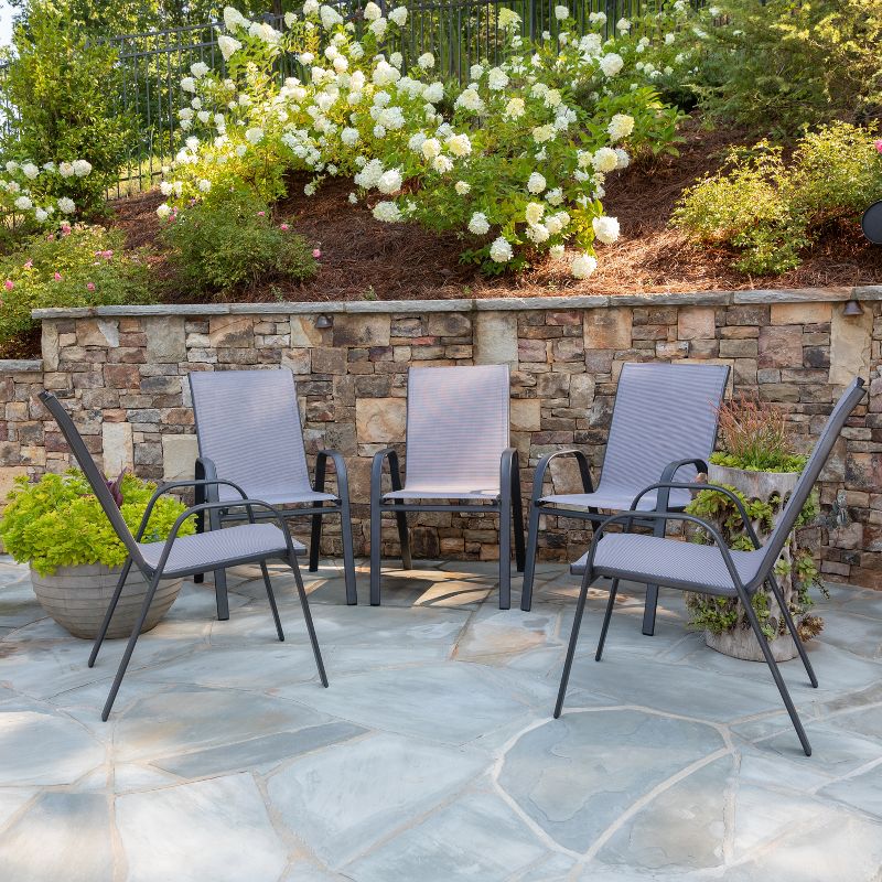 Emma and Oliver 5 Pack. Outdoor Stack Chair with Flex Comfort Material and Metal Frame, 2 of 13