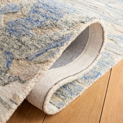 Ivory and Natural Floral Hand-Tufted Wool Area Rug