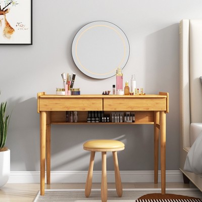 Vanity desk with mirror and makeup items