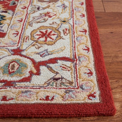 Handmade Red and Ivory Wool Rectangular Area Rug 4' x 6'