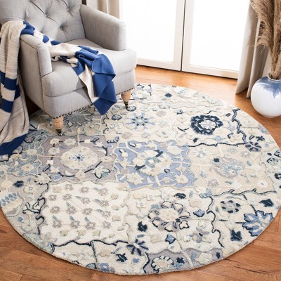 Elegant Charmaine Blue Wool 6' Round Hand-Tufted Area Rug