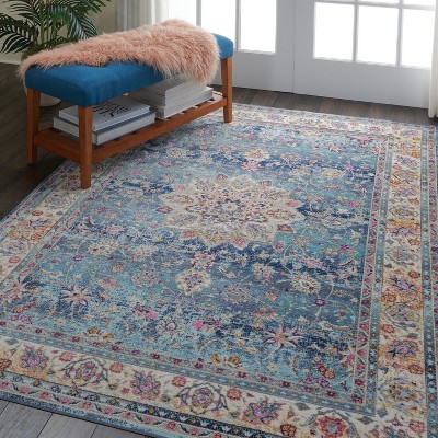 Vintage Blue and Ivory Synthetic 4' x 6' Area Rug