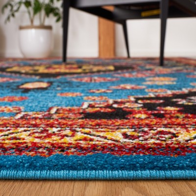 Antique Patina Blue Synthetic Rectangular Area Rug 5'3" x 7'6"