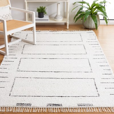 Casablanca 3' x 5' Ivory and Black Wool Shag Area Rug