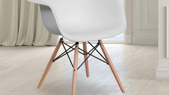 Emma and Oliver Plastic Accent Dining Chair with Arms and Wooden Legs, 2 of 13, play video