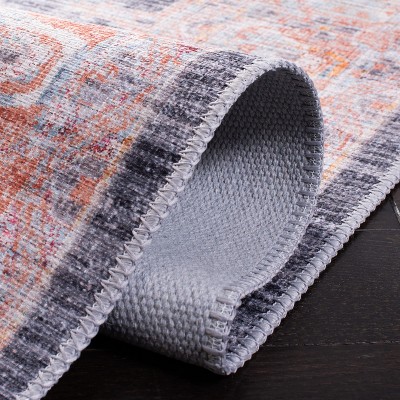 Serapi 6'7" x 9' Blue and Terracotta Washable Area Rug