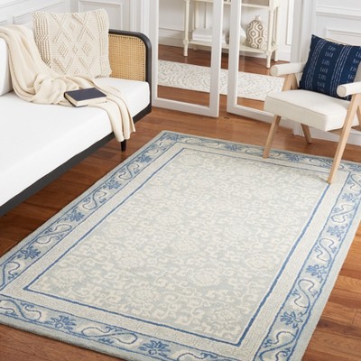 Ivory and Light Blue Tufted Wool Area Rug