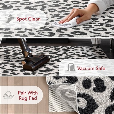 Dark Grey Tufted Leopard Print 8' x 10' Synthetic Area Rug