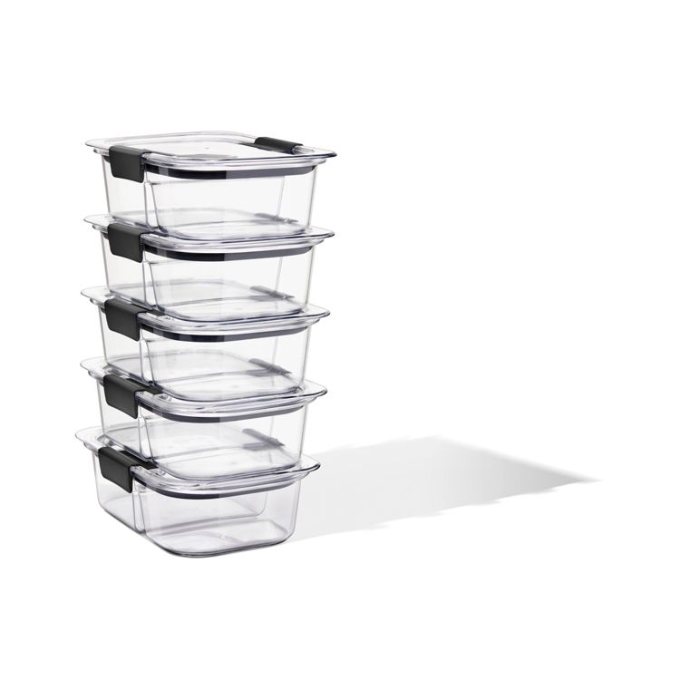 A stack of five clear rectangular containers with black colored latches on the lids.