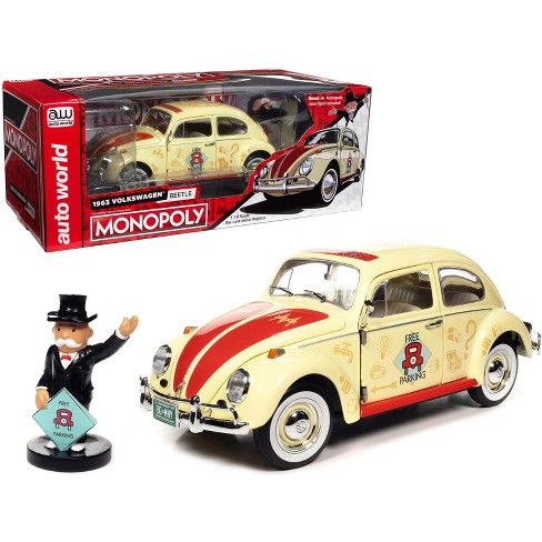 1963 Volkswagen Beetle Yukon Yellow with Monopoly Graphics Free Parking and Figure 1 18 Diecast Model Car by Auto World