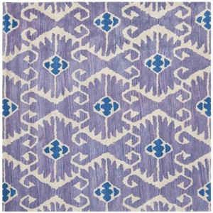 Wyndham WYD323 Hand Tufted Indoor Rugs - Safavieh - 1 of 3