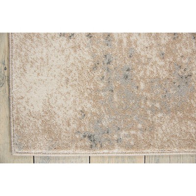 Ivory and Teal Abstract Rectangular Synthetic Rug 9'3" x 12'9"