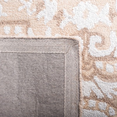 Ivory and Beige Rectangular Tufted Wool Area Rug
