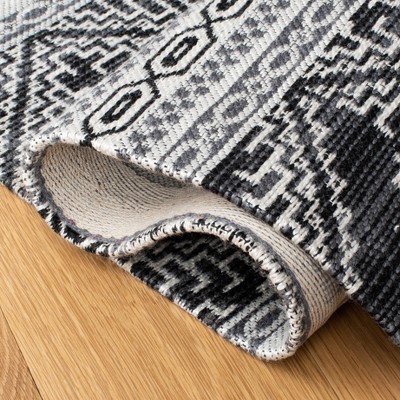 Handmade Black Synthetic Flat Woven 6' x 9' Rug