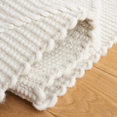 Ivory Handwoven Wool and Cotton 4' x 6' Area Rug