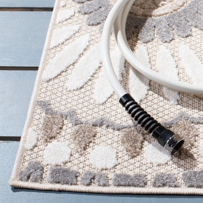 Grey and Ivory Floral Synthetic Indoor/Outdoor Area Rug