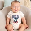 The Juniper Shop America Flag Cherries Coquette Baby Short Sleeve Bodysuit - 3 of 4