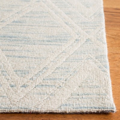 Light Blue and Ivory Geometric Wool 4' x 6' Area Rug