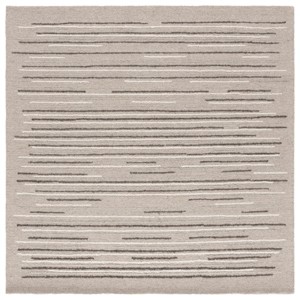 Ebony EBN527 Hand Tufted Indoor Rugs - Safavieh - 1 of 4