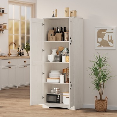 Open white cabinet showing shelves with items inside