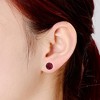 Elegant 14K Yellow Gold stud earrings with a colored cubic zirconia birthstone for a sophisticated touch. - 3 of 4
