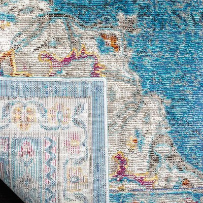 Navy and Ivory 4' x 6' Synthetic Oriental Area Rug