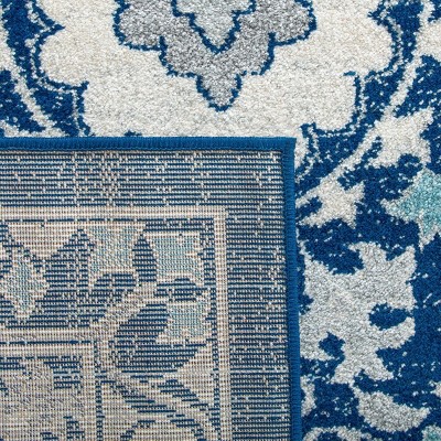 Evoke Blue and Ivory Synthetic 11' x 15' Area Rug