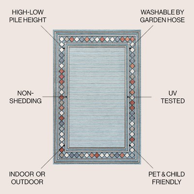 Sebastian Blue and Ivory Geometric Synthetic 5' x 8' Area Rug