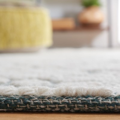 Handmade Ivory and Green Wool 9' x 12' Area Rug
