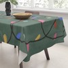Gigi Rosado Christmas fairy lights Tablecloth -Deny Designs - 3 of 3