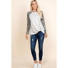 Slickblue Chic Casual French Terry Top with Animal Print Sleeves - Side Twist Design, Oat/Red, S/M/L - 2 of 4