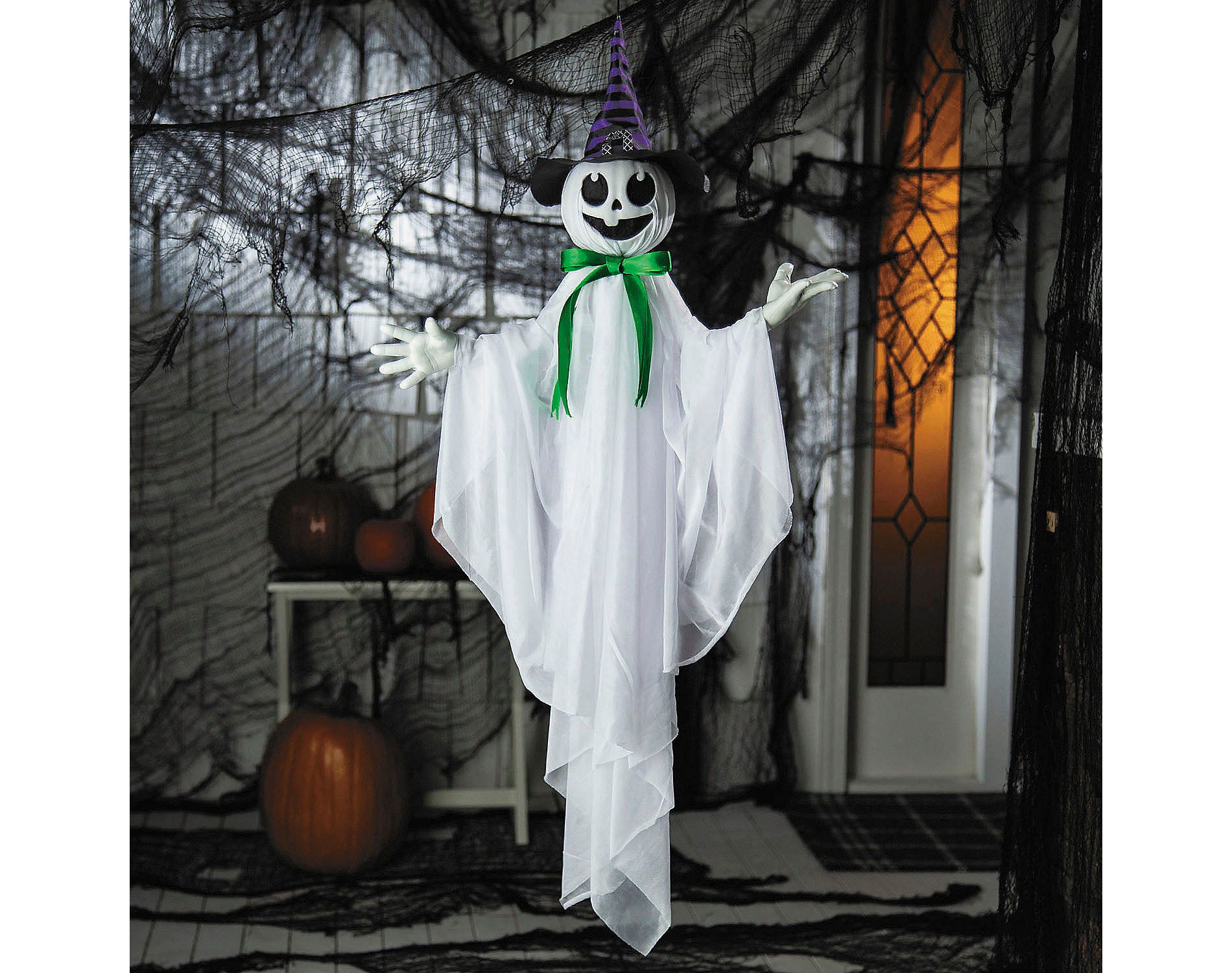 Morris Costumes 39 1/4" Animated Hanging Smiling Ghost with Witch Hat & Green Bow Halloween Decoration