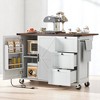 54.5" Farmhouse Kitchen Island Cart with Drop Leaf, Outlet, Internal Storage Racks, 3 Drawers, Sliding Barn Doors, Lockable Wheels, Kitchen Cabinets - 3 of 4