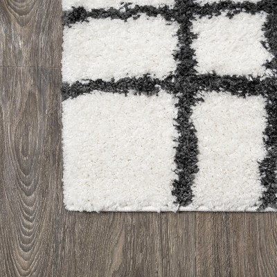 Ivory and Black Moroccan-Inspired Geometric Shag Rug