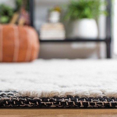 Ivory and Black Hand-knotted Wool 4' x 6' Shag Rug